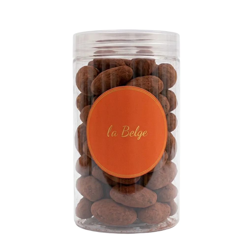 Premium Belgian cocoa coated pecans in a clear La Belge cylinder.