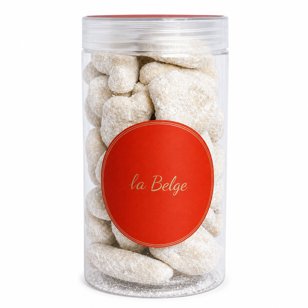 Premium Belgian coconut coated pecans in a clear La Belge cylinder.