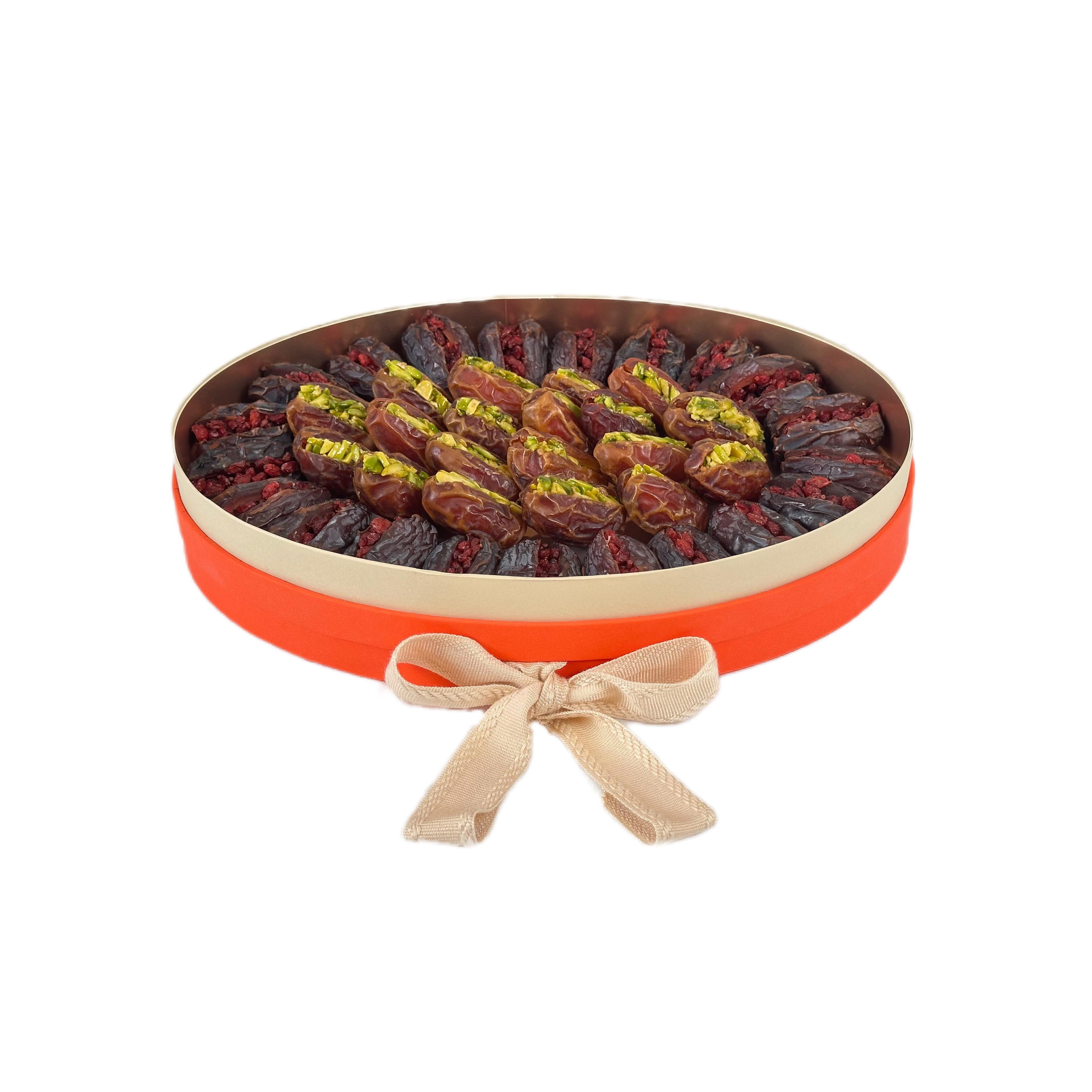 Medjool and Sagai dates stuffed with pistachio and pomegranate by La Belge