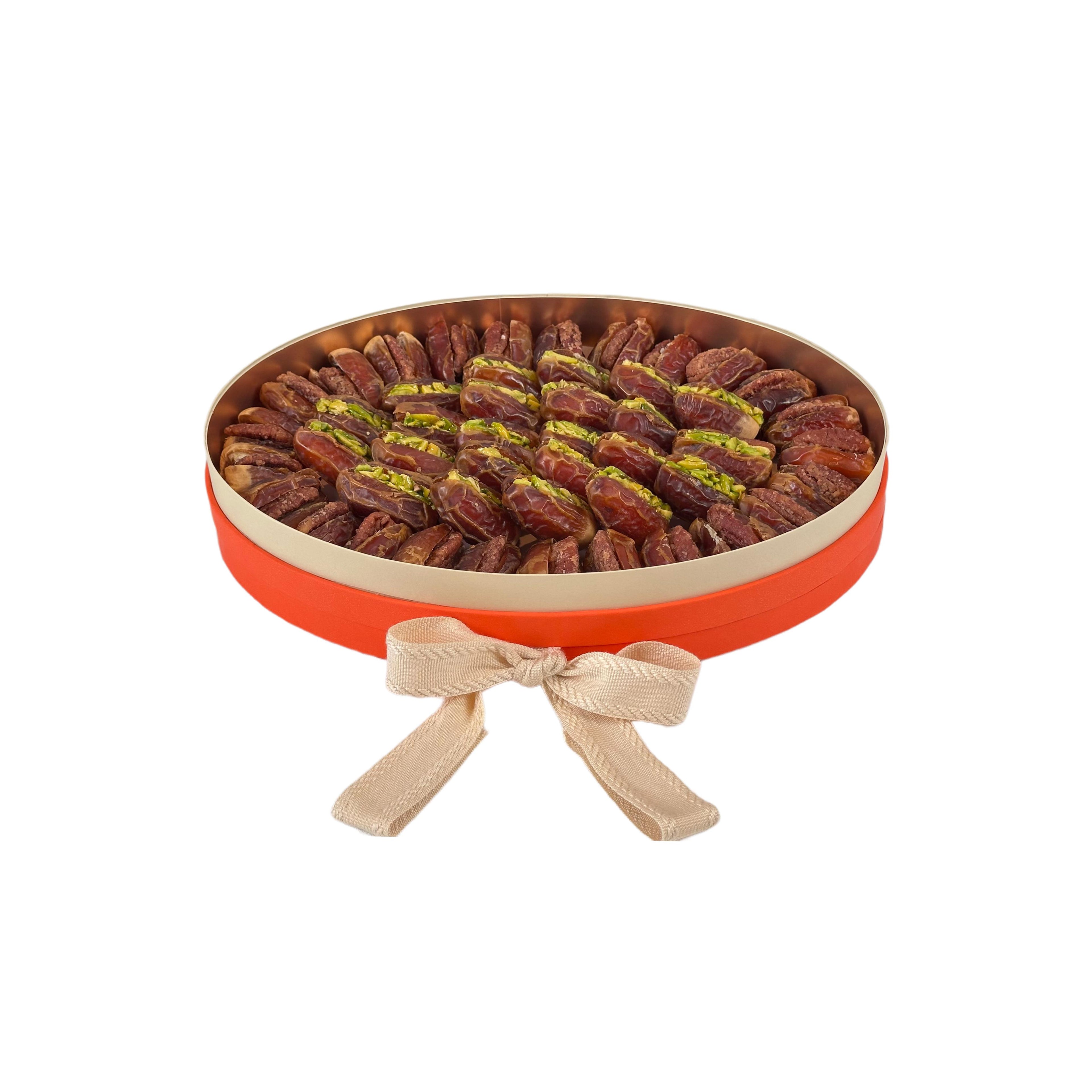 Open box of Sagai dates stuffed with pistachio and pecan by La Belge